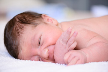 Fototapeta na wymiar After childbirth newborn baby