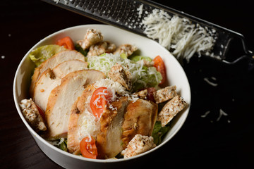 healthy salad with meat, tomatoes, lettuce