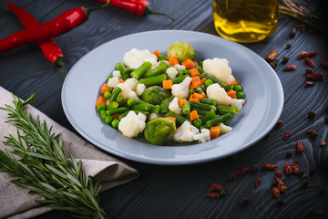 Delicious mix of vegetables on the plate. View from above. Close-up