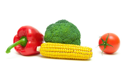 broccoli, tomatoes, corn and sweet pepper on a white background