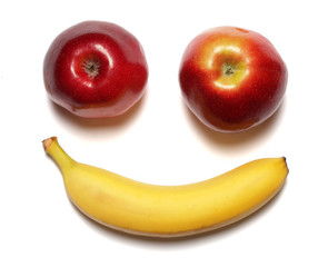 smile banana and red apple isolated on white background