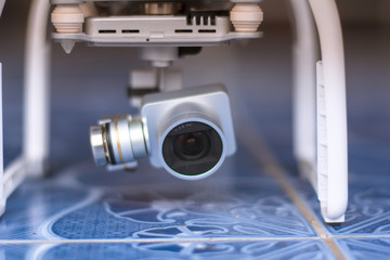 Equipment camera white drone, quadrocopter with photo camera flying concept.