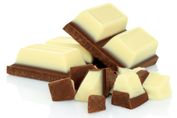 Broken chocolate bars on white background