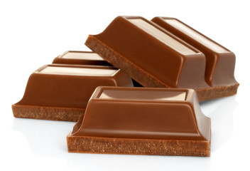 Broken chocolate bars on white background