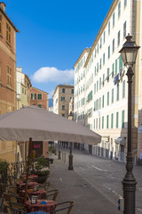 Outdoor cafeteria in a street in Camogli