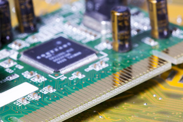 Fototapeta premium Electronic chip and standard inscriptions of resistors and condensers, small depth of sharpness....