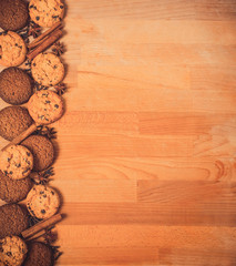 Сhristmas decoration and gingerbread cookies on wooden background with empty copy space for your text. Holiday, celebration and cooking concept. new year and christmas postcard or invitation