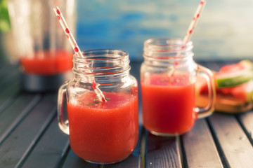 The watermelon smoothie in a drinking jar