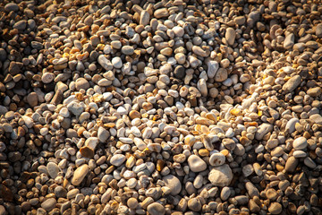 Footprints, Etretat, France. 2010  -  Foot print on a pebble beach in Normandy France.
