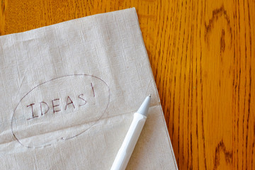 Ideas circled by pen on napkin