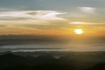 Cloudy skies and stunning hilltop in winter.