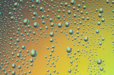 Close up water bubbles on glass, Colorful background