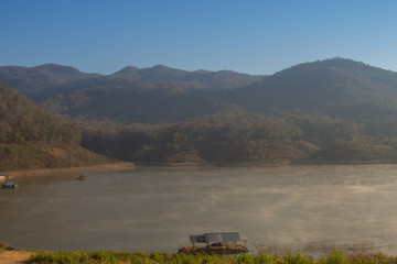 Fototapeta na wymiar A morning mist, View of Ping River, Lamphun province, Thailand..
