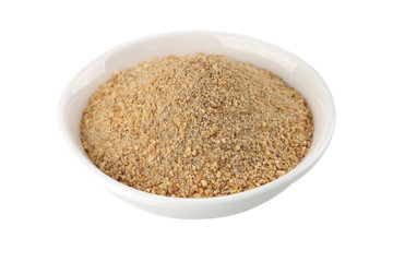 Ground roasted rice isolated on white background