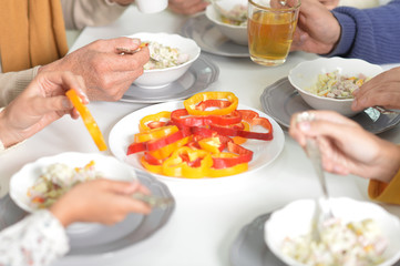 family eating salad 