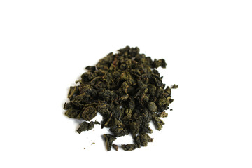 Heap pile of milk oolong green tea isolated on white background