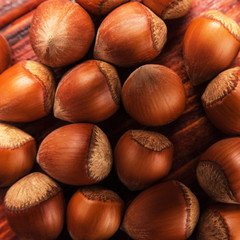 Obraz premium Nuts on a wooden background