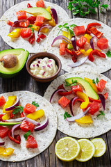delicious healthy fajitas with chunks of smoked salmon