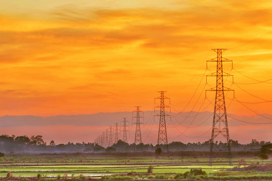 Fototapeta Landscape of HDR electric pole at sunset twilight