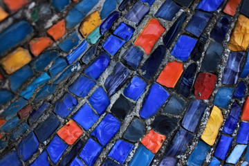 Colorful pattern of geometric mosaic old wall from smalt.