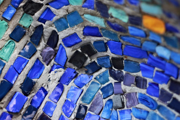 Colorful pattern of geometric mosaic old wall from smalt.