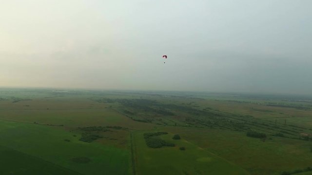 Paraplane in the air aerial shot 4k