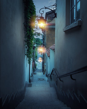 Fototapeta Romantic street of the old town in Warsaw at night, Poland