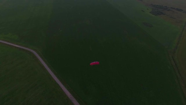 Paraplane in the air aerial shot 4k