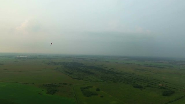Paraplane in the air aerial shot 4k