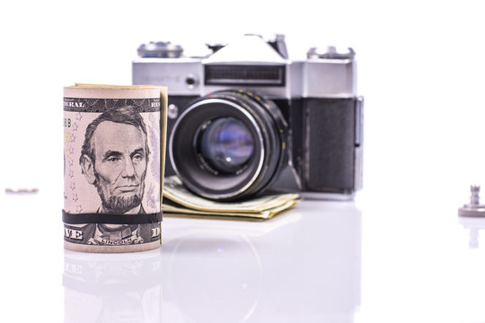 money and film cameras 