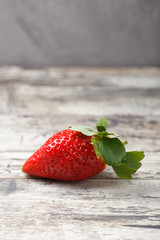 Fresh strawberries on a wooden table