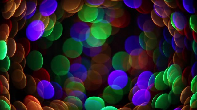 Abstract holiday background with fairy tale blinking lights in magic tunnel. Christmas and new year twinkling decoration. Celebration spirit in merry flashing colorful specks on dark night backdrop.
