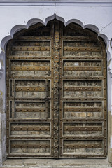 Ornate wooden doorway, puskkar, India