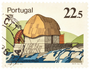 Old water mill on postage stamp © Vic