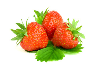 Red berries of a strawberry with leaves, isolated.