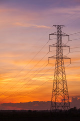 Electric pole at sunset twilight landscape