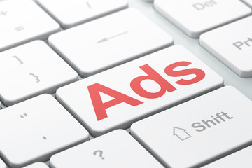 Marketing concept: Ads on computer keyboard background