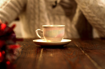 cup of coffee on the wooden table