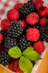 blueberries, raspberries and black berries shot top down