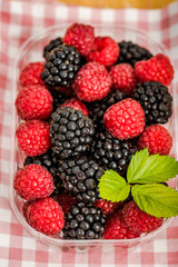 blueberries, raspberries and black berries shot top down