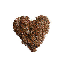 Linseed  heart shaped on a white background 

