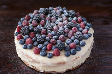 Pie with fresh berries. Raspberries blackberries blueberries.