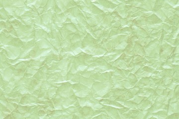 Obraz na płótnie Canvas Green retro wrinkled kraft paper background