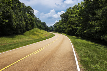 View of the Natchez Trace Parkway in Mississippi; Concept for travel in America and road trip in...