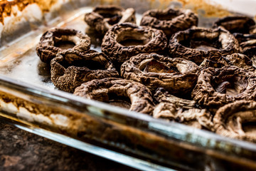 Baked Mushrooms in glass bowl. (scary food)