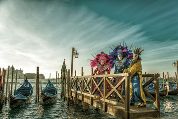Obraz premium people in masks and costumes on Venetian carnival