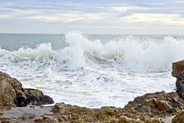 Large waves breaking close to a rocky coastline