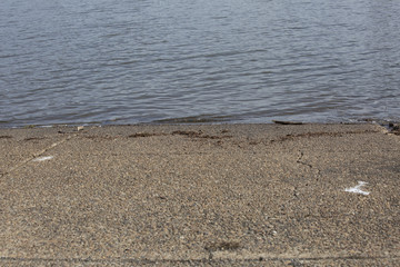 Garbage on a Lake Boat Ramp