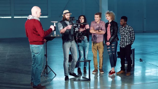 The video making team shooting on a special equipment camera.