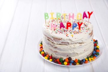 Birthday cake with Candles .Holiday Bright Candy Baking.Traditionally  Decoration.Copy space for Text. selective focus.